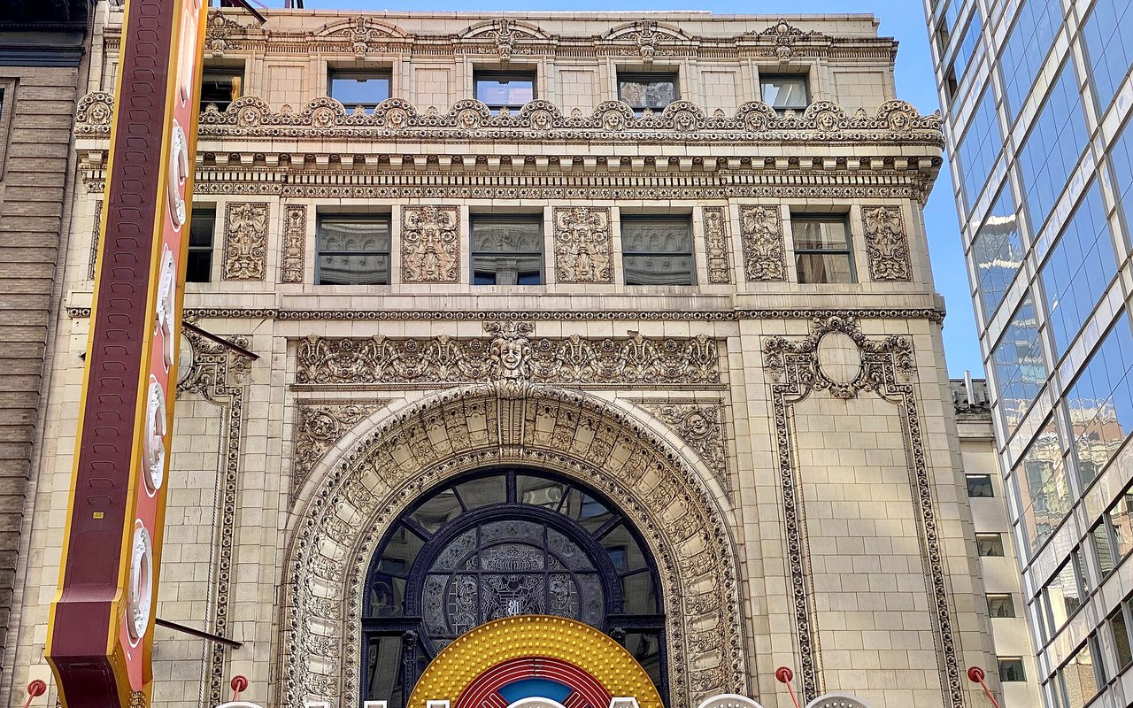 The carved arch of the Chicago Theatre on State Street